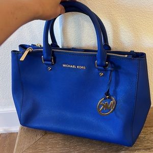 Michael Kors royal blue handbag with dust bag and leather conditioner